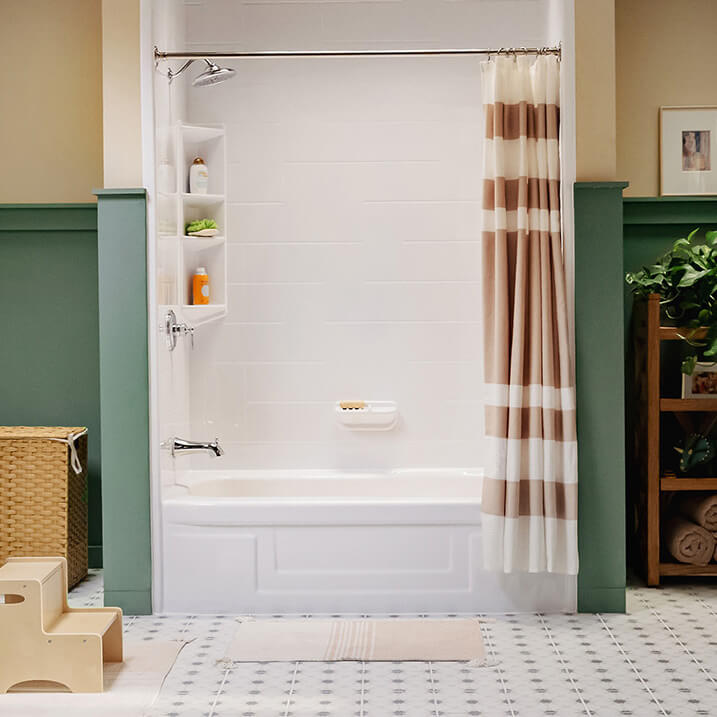 A spacious bathroom with a renovated bathtub.