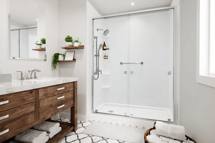 Bathroom with white towels folded and organized under the sink