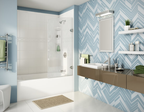 Blue themed bathroom with linear patterned wallpaper and brown vanities