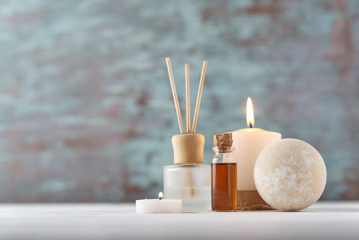 Burning candle, essential oils and difuser