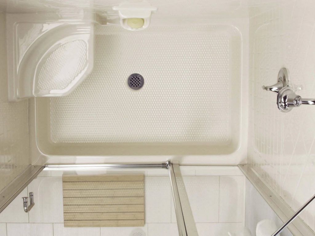 Top view of a shower with a bench