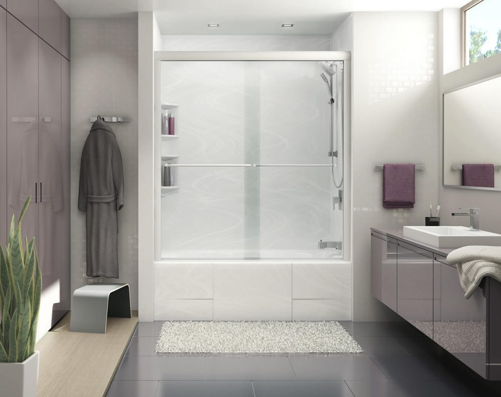 a sleek elegant bathroom with enclosed cabinets and bathtub with sliding doors