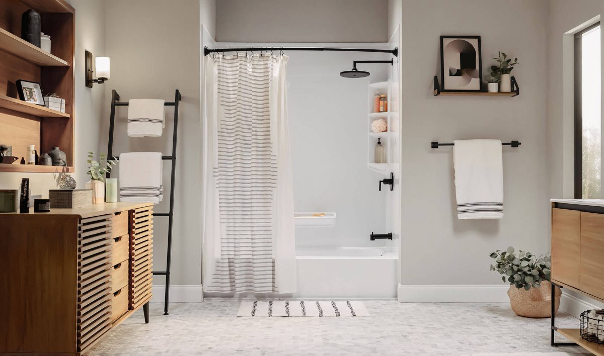 A modern white bathroom with a focus on the bathub